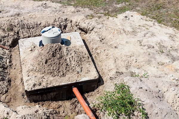 foul odors, slow draining sinks, and sewage backups are signs that you may need septic tank pumping